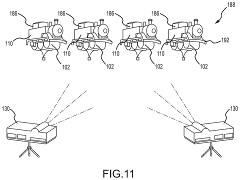Train-shaped projection on vapor, drawing sheet 7 from US 2026/0246909 A1