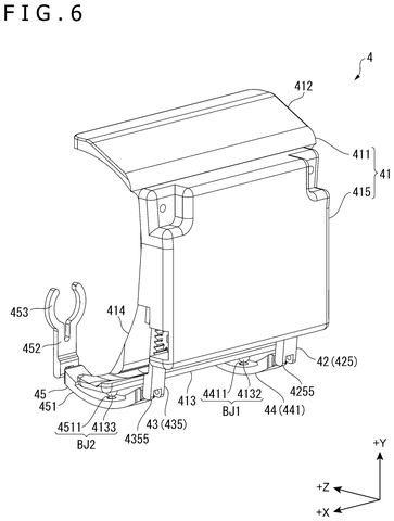 Rear angled view of the clip-on device., drawing sheet 6 from US 2026/0295446 A1